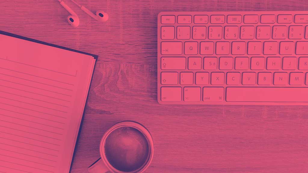 keyboard with notepad describing creative effective marketing strategies